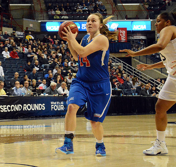 Sarah Benedetti drives to the basket in Saturday night's game against UConn at Gampel Pavilion.